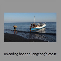unloading boat at Sangeang's coast